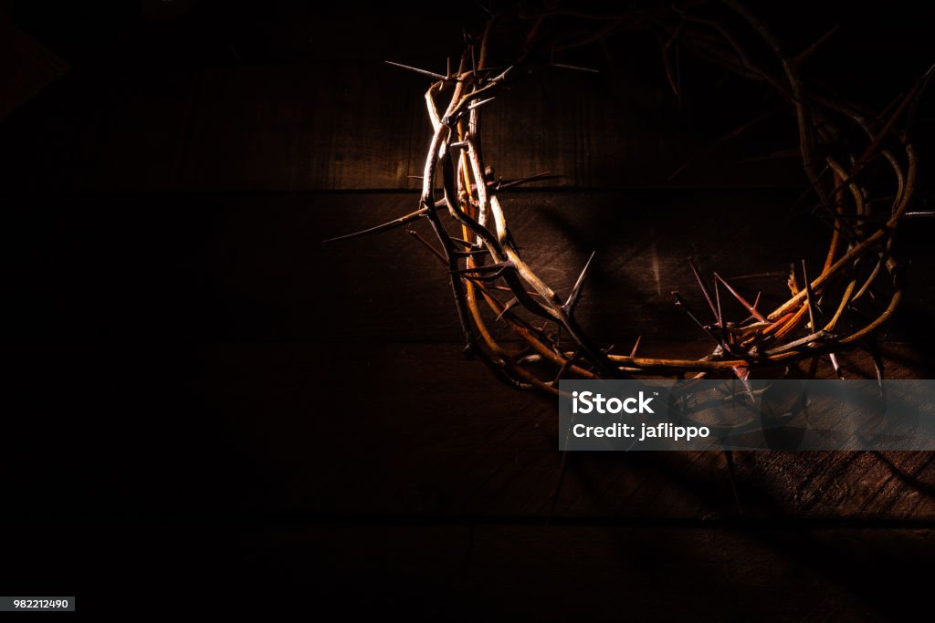 A crown of thorns on a wooden background. Easter Theme An authentic crown of thorns on a wooden background. Easter Theme Jesus Christ Stock Photo