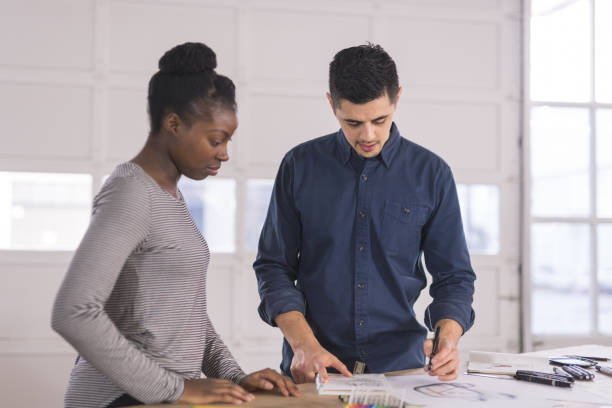 istock Design partners strategize in their modern studio 982215984