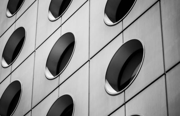 istock Modern office building detail, glass surface with B&W color 982222904