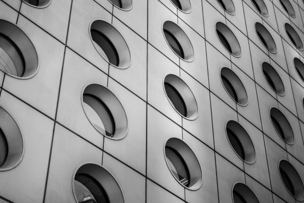 istock Modern office building detail, glass surface with B&W color 982222934