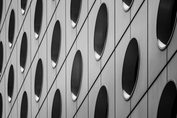 istock Modern office building detail, glass surface with B&W color 982222950