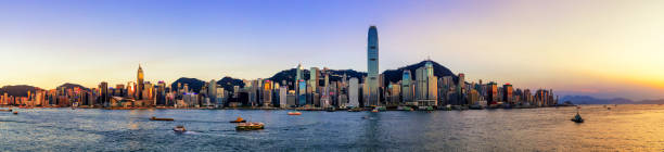 istock Panoramic View of Hong Kong Skyline at Sunset 982223674