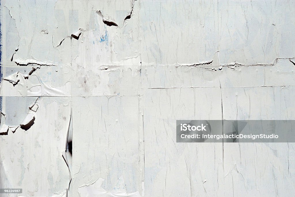 Blank billboard with weathered posters Raggedy, torn layers, ready for your additions. Wall - Building Feature Stock Photo