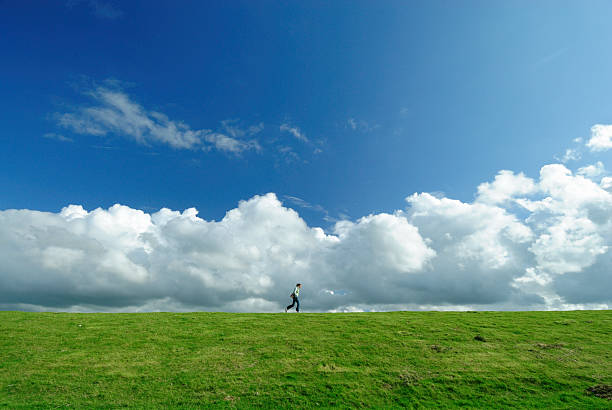 People walking the river bed (background material). Shooting Location: Tokyo metropolitan area