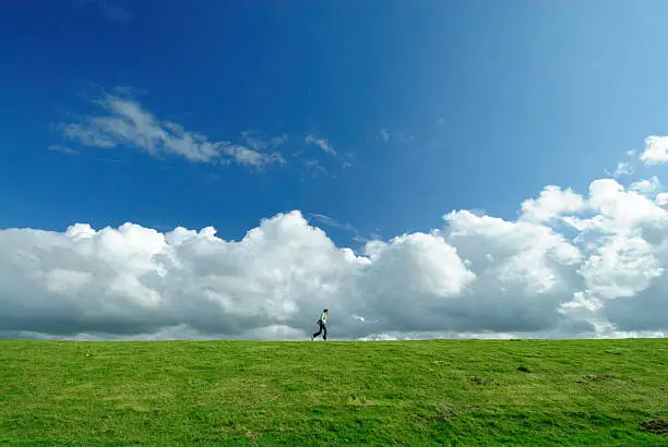 Photo of Woman walking on a dyke