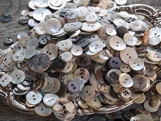 istock Perfectly imperfect antique shell buttons 98225876