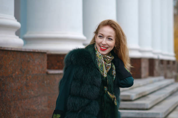 istock Red-haired girl in autumn park 982264280