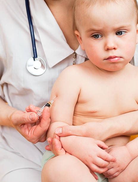 istock Little baby get an injection 98230325