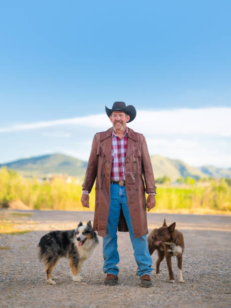 istock Rancher with his dogs 982317390