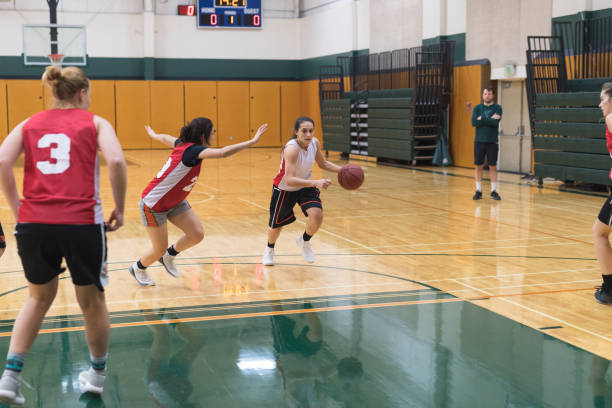 istock Women's College Basketball Practice 982324738
