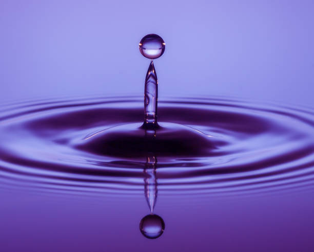 istock Water Drop Photography - Liquid Drop Art 982345874