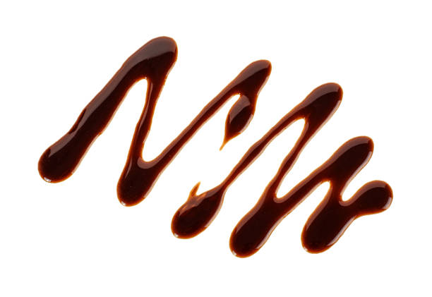 istock Chocolate sauce isolated on a white background 982350906