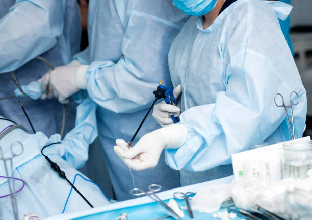 istock Group of surgeons at work. Surgery excision tumor. 982355096