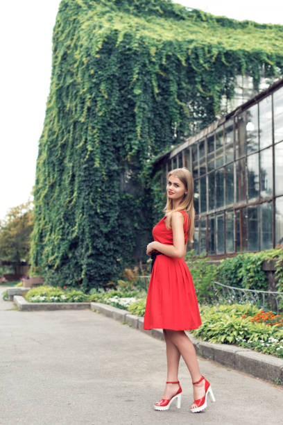 Blonde in bright red dress
