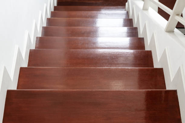 istock Hardwood stair steps, interior stairs material and home design 982360082