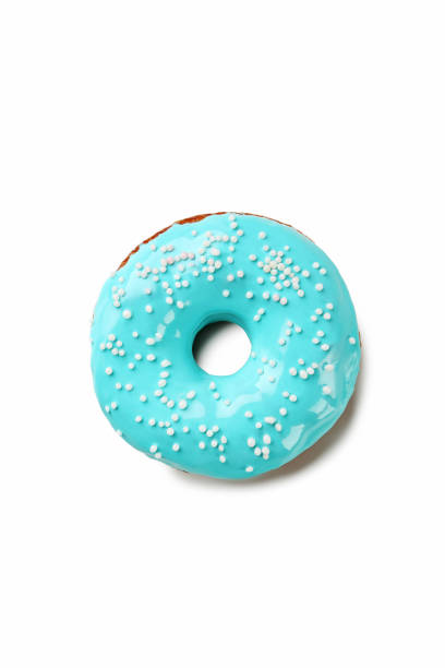 istock Tasty donut with sprinkles isolated on a white 982365030