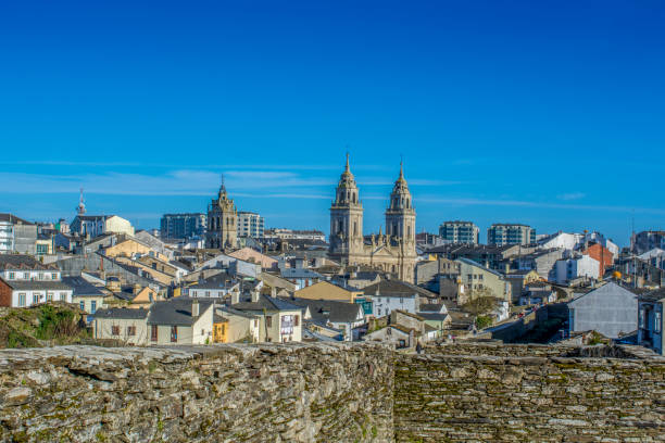 Lugo, Galicia, Spain, April 2015 : Cathedral towers protruding from the walled town of Lugo
