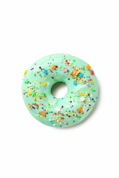 istock Tasty donut with sprinkles isolated on a white 982372896