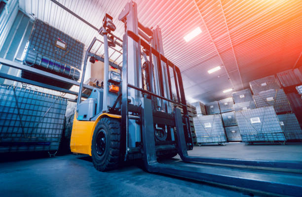 Forklift loader. Pallet stacker truck equipment at warehouse Forklift loader. Pallet stacker truck equipment at warehouse. Background warehouse containers stock pictures, royalty-free photos & images