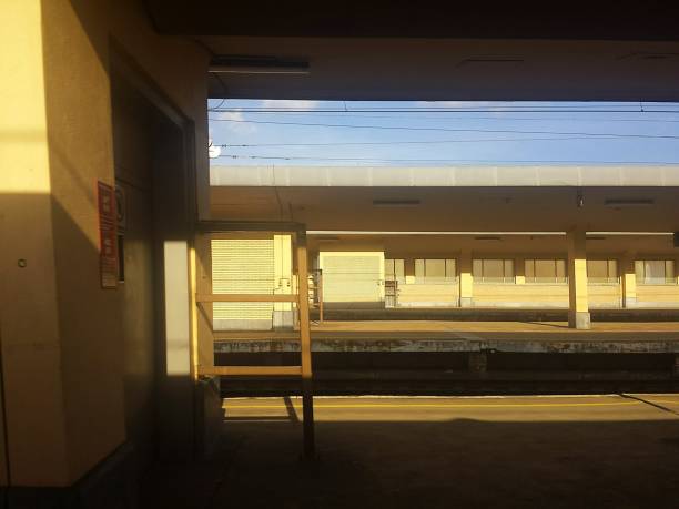 istock Train platform station railroad tracks derelict abandoned 982395392