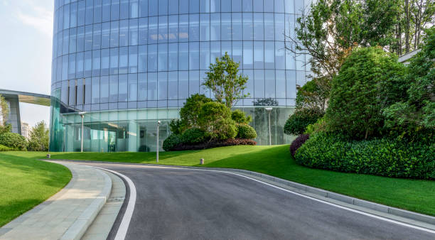 istock Empty urban road near modern building exterior 982396442