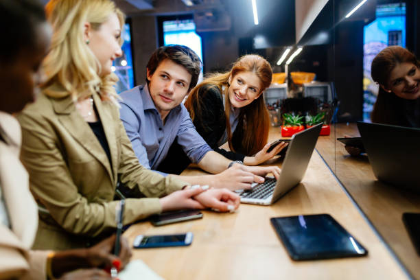 istock Coworkers bonding in pub 982396778