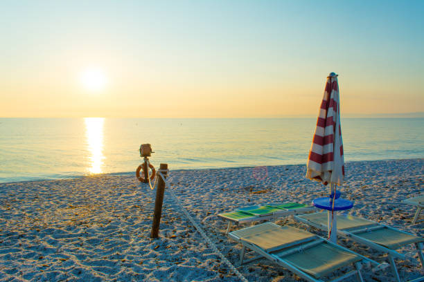istock sunrise on the beach in sardinia 982399498