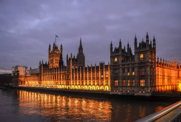 istock Palace of Westminster in night illumination 982428500