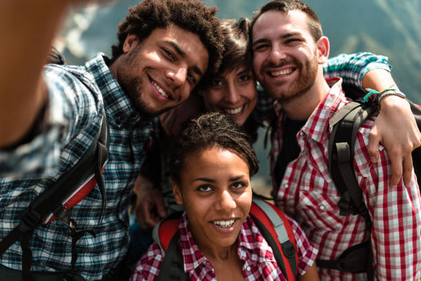 istock friends take a selfie on the mountain 982442942