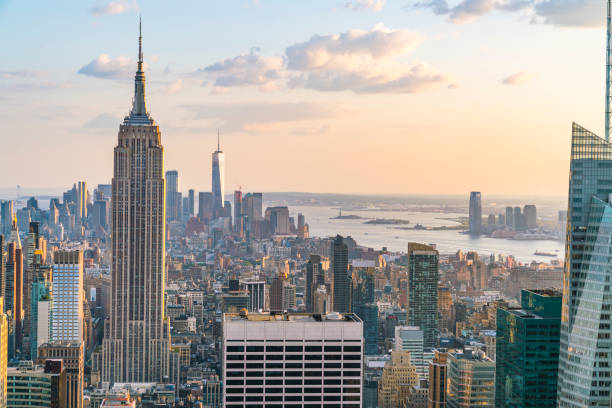 istock new york skyline at sunset. 982486978