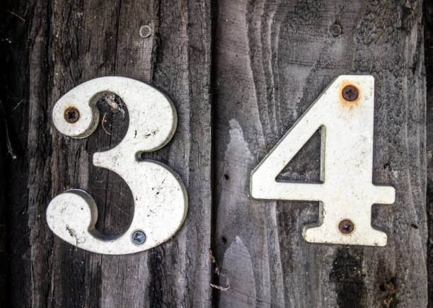 istock Written Wording in Distressed State Typography Found Number Thirty Four 34 982488460