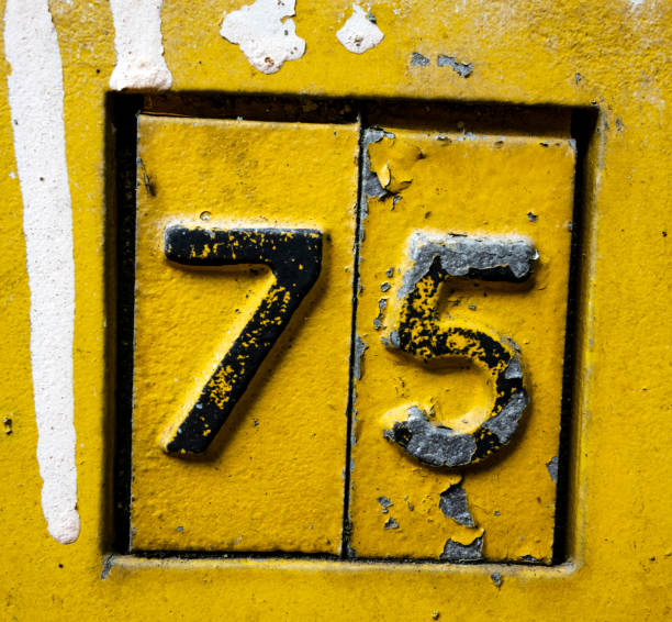 istock Written Wording in Distressed State Typography Found Number 75 Seventy Five 982496744
