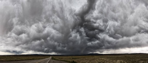 istock Utah road and incoming storm, panorama 982512306