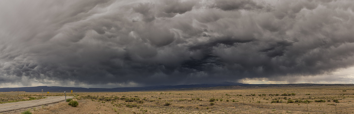 Utah road and incoming storm, panorama