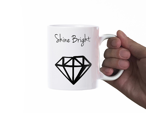 Hand Holding Shine Bright Quote Mug