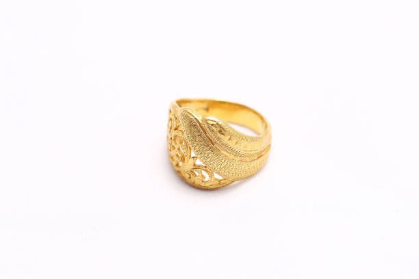 istock Beautiful gold ring on white background 982515368