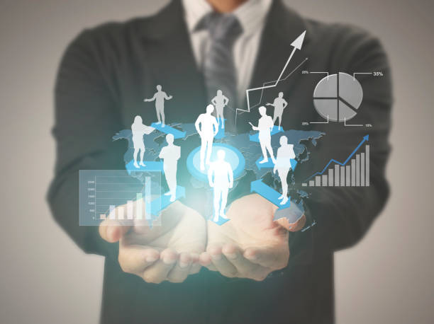 istock businessman with financial symbols coming 982520104