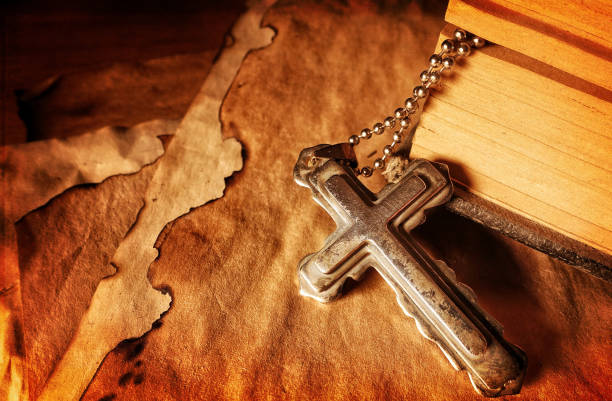 istock Christianity Religion Symbol Jesus Cross and Bible 982537708