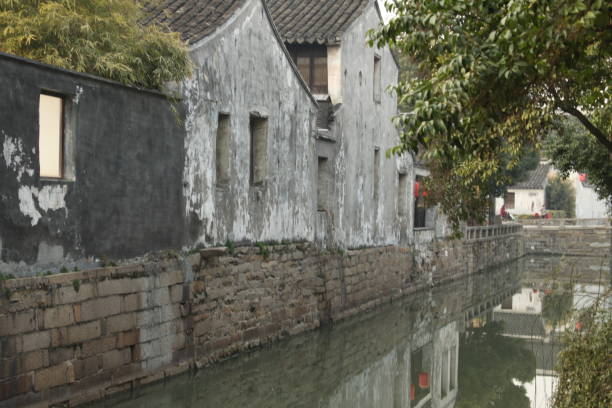 istock Beautiful Chinese city with canal bridge and tree 982564982