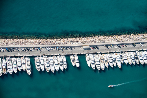 Overhead view of yachts parked in the marina.