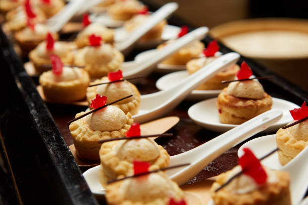 istock Canapes with dessert on the banquet table. 982579758