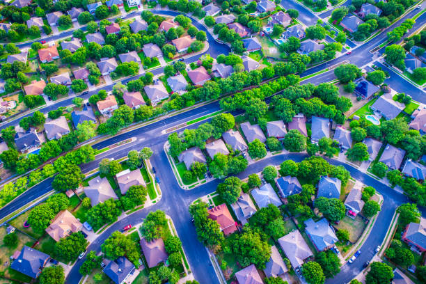 istock Colorful rooftops , modern suburb development , buying and selling homes 982588446