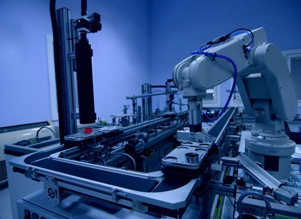 istock Robotic arm on a smart factory manufacturing line 982603854