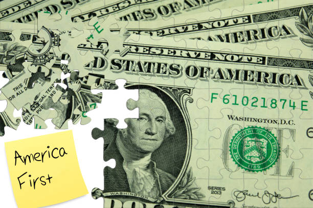 istock Dollar banknotes as a puzzle and slogan America First 982604256