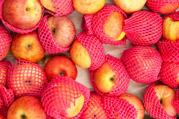 istock Yellow-red apples in the package 982606018