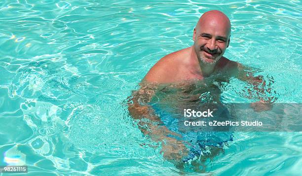Tropical Backgrounds Man In The Water Stock Photo - Download Image Now - Adult, Adults Only, Blue