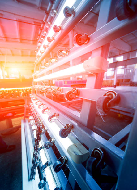 Conveyor belt for production a window pane. Industrial equipment. Background