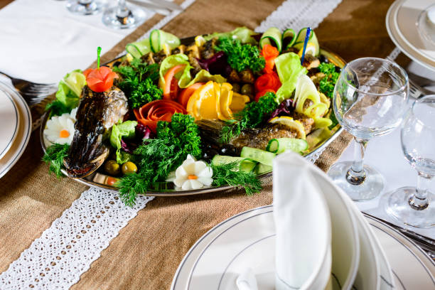 istock Serving food in the restaurant. Appetizing cooked stuffed pike w 982618654