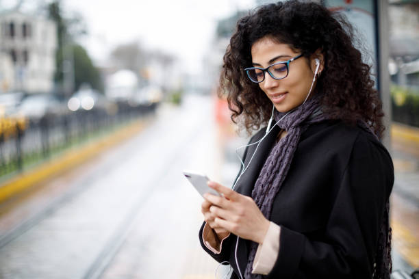 istock Woman waiting for train at the station 982635116