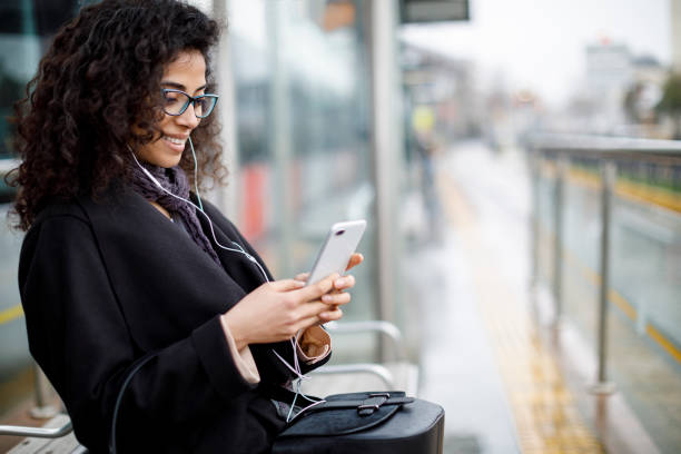 istock Woman waiting for train at the station 982635300